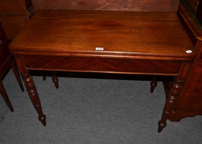 Lot 1218 - A 19th century mahogany tea table