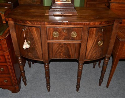 Lot 1220 - A mahogany breakfront sideboard