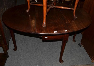 Lot 1249 - 19th century mahogany drop leaf dining table