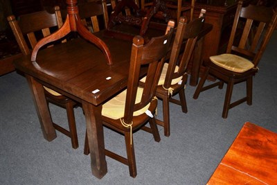 Lot 1261 - A modern oak refectory table and six chairs