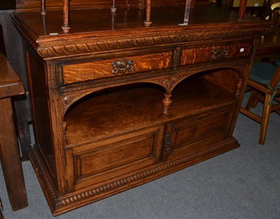 Lot 1263 - An early 20th century carved oak buffet