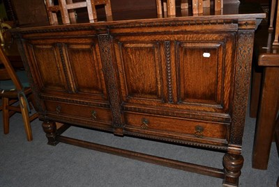 Lot 1267 - Early 20th century carved oak sideboard