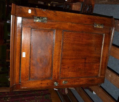 Lot 1272 - A George III oak corner cupboard