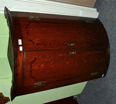 Lot 1280 - Georgian oak bow fronted corner cabinet