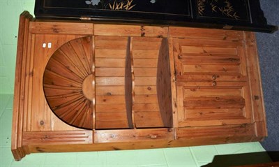 Lot 1287 - A Georgian style pine corner cupboard, integral cornice above twin shaped shelves, twin...