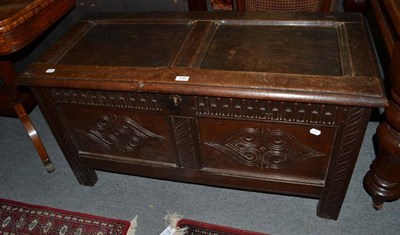 Lot 1302 - Carved oak blanket chest