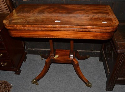 Lot 1303 - 19th century crossbanded mahogany fold over tea table