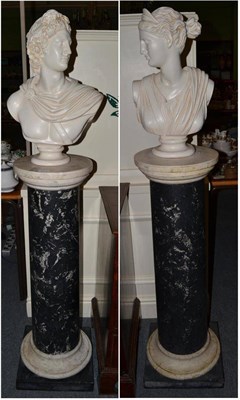 Lot 1314 - Pair of composition busts on grey and white column bases