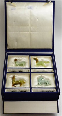 Lot 16 - Eight carved hardstone figures of horses in a fitted case