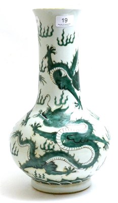 Lot 19 - A Chinese baluster vase decorated with dragons and flaming pearls, 37cm high