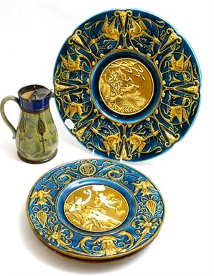 Lot 22 - A Royal Doulton stoneware jug together with three Austrian majolica plaques