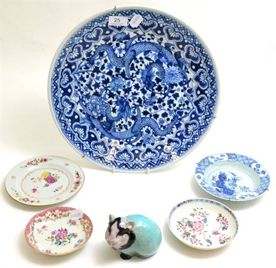 Lot 25 - A 19th century oriental blue and white charger, four 18th century saucers, plates and an...
