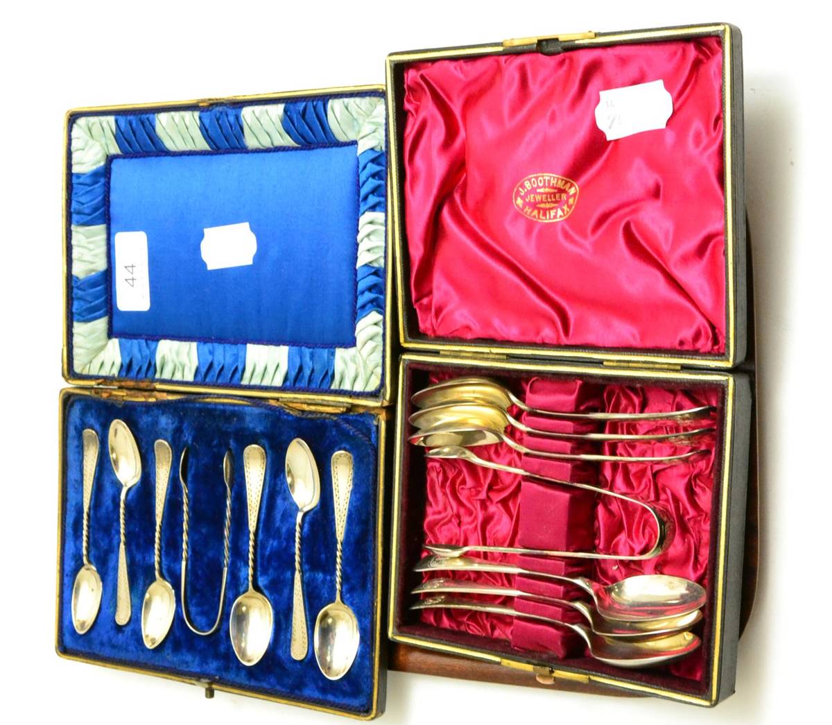 Lot 44 - A cased set of silver coffee spoons and a cased set of silver teaspoons