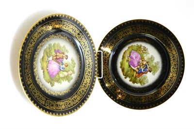 Lot 48 - Pair of Vienna porcelain plates, each decorated with figures within a gilded border, 31.5cm...