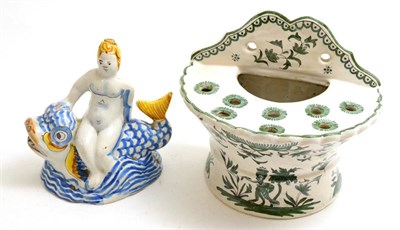 Lot 55 - A Faience bough pot and a Delft ornament