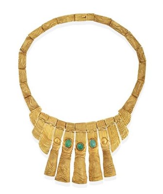 Lot 195 - An 18 Carat Gold and Emerald Necklace, by Jaqueline Steiger, the graduated front of heavily...