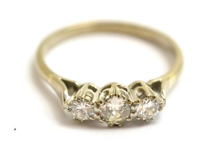 Lot 106 - An 18ct white gold diamond three stone ring, total estimated diamond weight 0.60 carat...