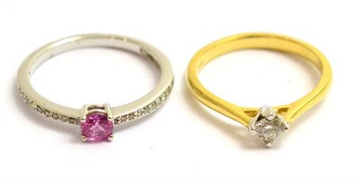 Lot 114 - An 18ct gold diamond solitaire ring and an 18ct white gold pink sapphire and diamond ring