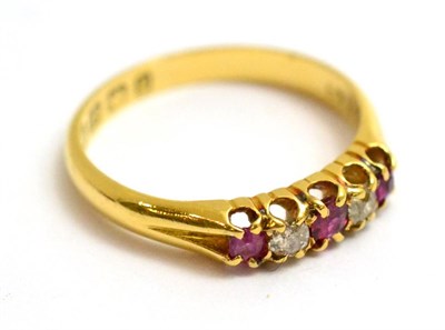 Lot 117 - An 18ct gold ruby and diamond five stone ring