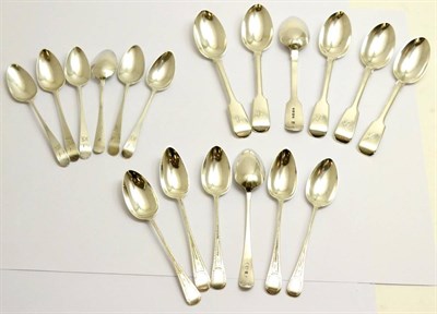 Lot 122 - A group of silver teaspoons including, a set of six George III spoons engraved with a monogram,...