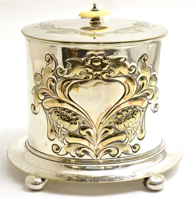 Lot 127 - A good silver plated biscuit barrel, the oval body decorated with Art Nouveau flowers and...