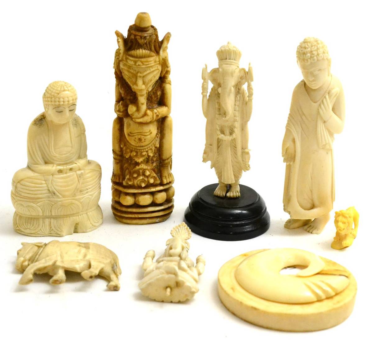 Lot 145 - A group of Indian and other ivory circa 1910-1920 including Ganesh, Buddha etc