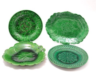 Lot 184 - A group of four majolica plates, all 19th century including Wedgwood