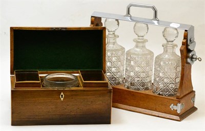 Lot 185 - A 19th century mahogany tea caddy fitted with two compartments and a glass bowl together with...