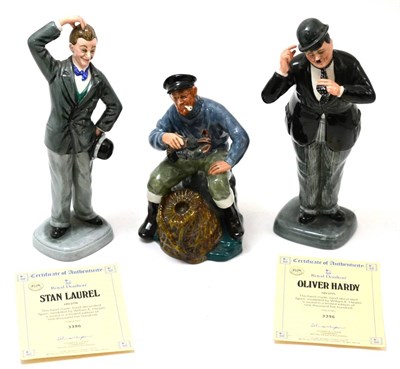 Lot 187 - Three Royal Doulton figures 'Oliver Hardy' HN2775, 'Stan Laurel' HN2774 and 'The Lobster Man'...