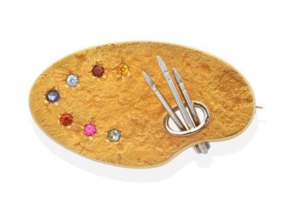 Lot 207 - A Multi-Gemstone Artist's Palette Brooch, a textured palette with three paint brushes and star...