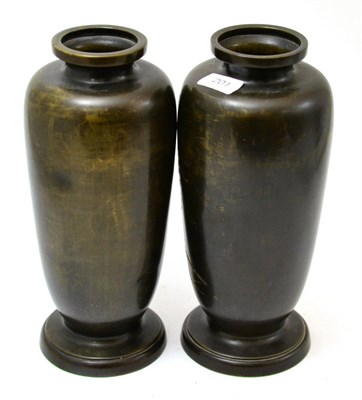 Lot 201 - A pair of Japanese bronze vases with silver wire inlay, late 19th/ early 20th century, 31.5cm high