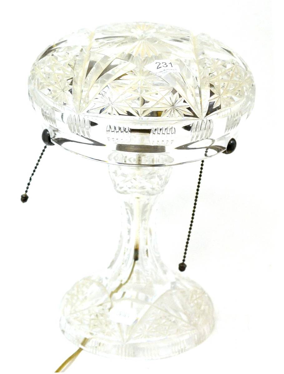 Lot 231 - A cut glass mushroom lamp with twin bulb fittings, 33cm high