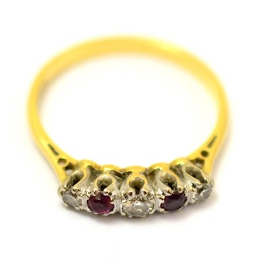 Lot 241 - A diamond and ruby five stone ring, stamped '18CT'