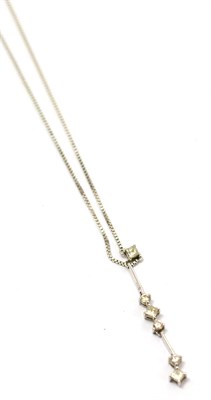 Lot 244 - An 18ct white gold and diamond necklace, the articulated drop set with round brilliant and princess