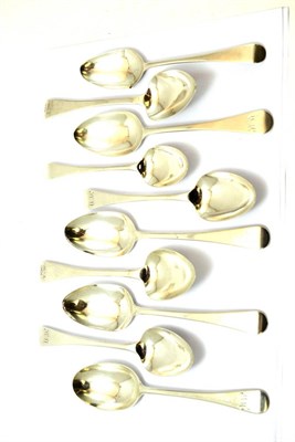 Lot 247 - Ten Georgian silver serving spoons