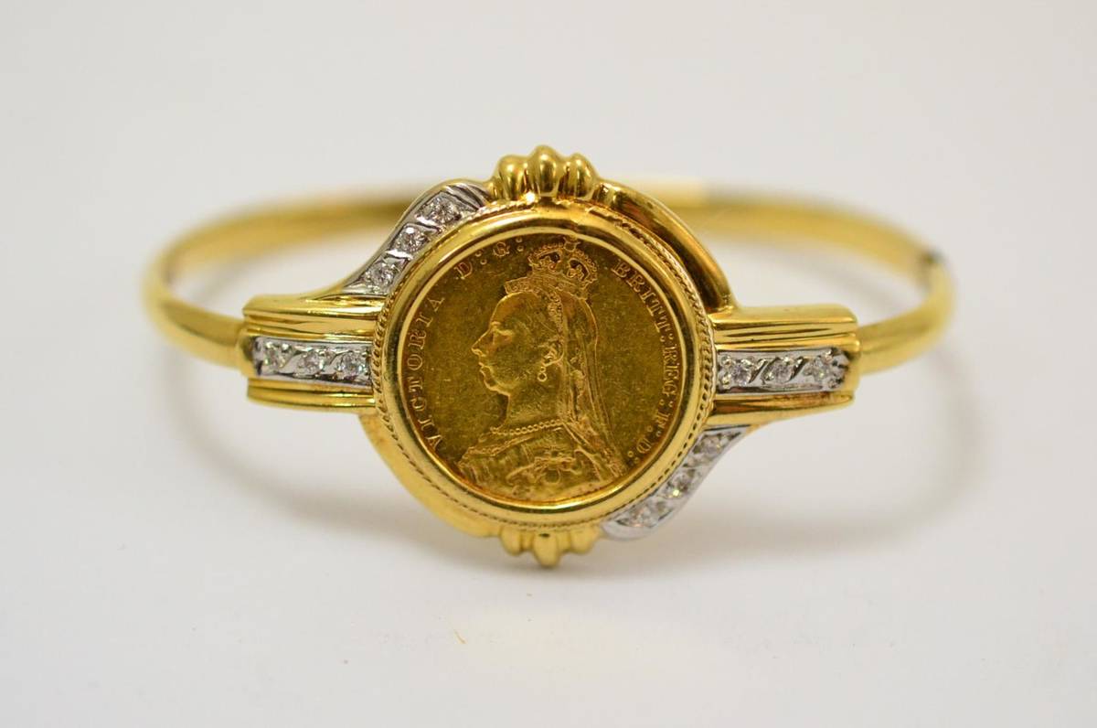 Lot 256 - A Victoria sovereign and a bangle