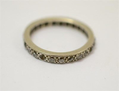 Lot 267 - A diamond eternity ring (worn)