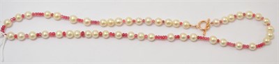 Lot 275 - A pink spinel and cultured pearl necklace, faceted pink spinel strung with cultured pearls,...
