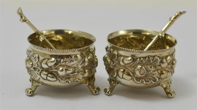Lot 278 - A pair of Mappin & Webb silver salts, London 1891, with acorn detailing and matching spoons...