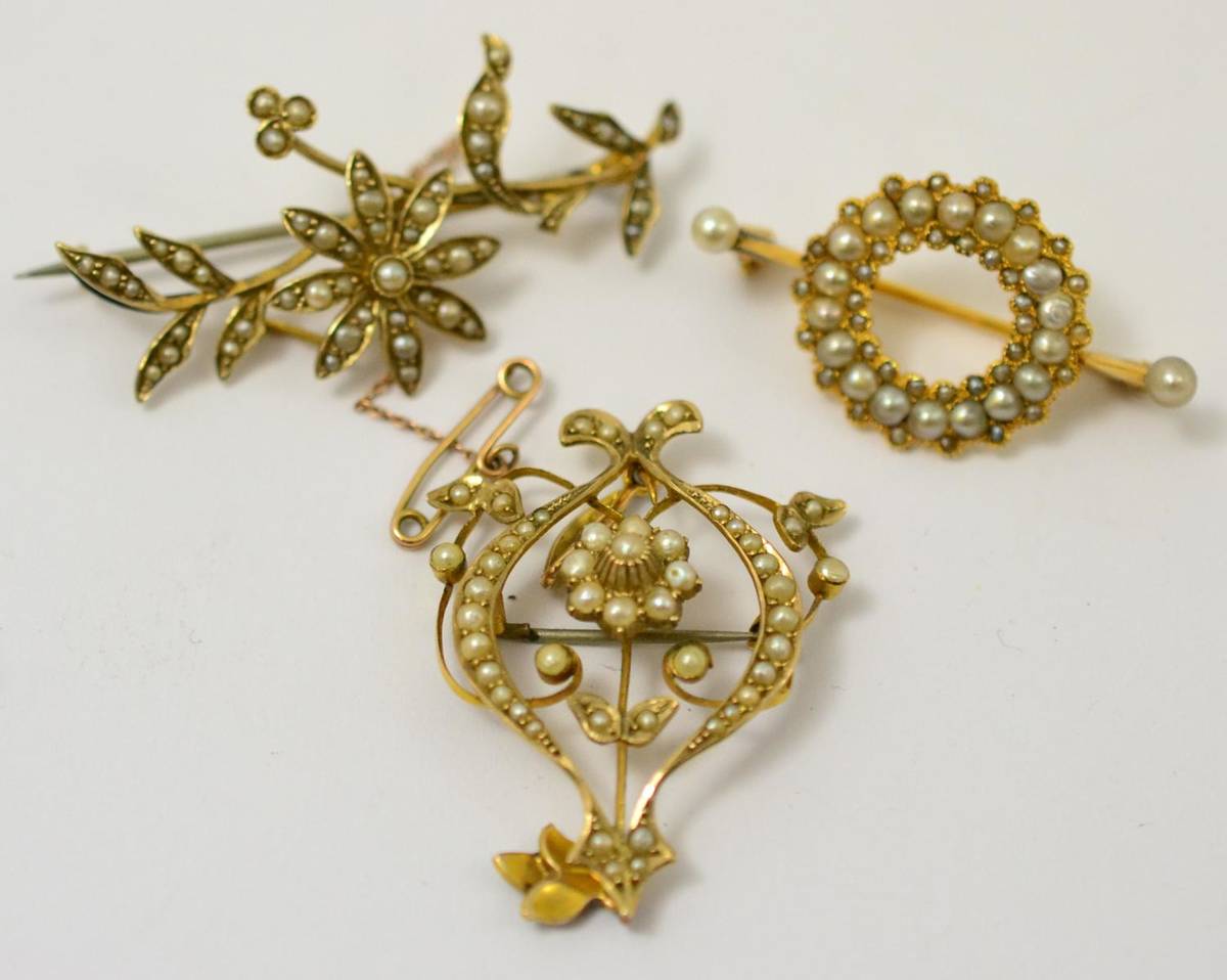 Lot 288 - A seed pearl set pendant/brooch and two seed pearl set brooches