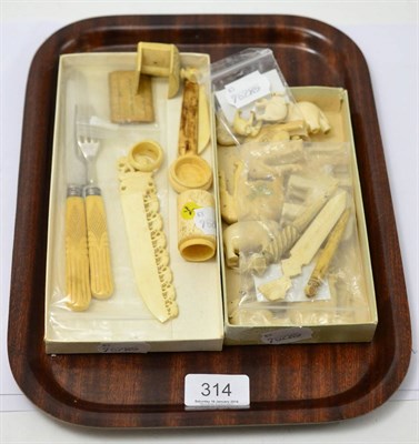 Lot 314 - A group of ivory circa 1920 including ivory handled fruit knife and fork, sewing implements,...