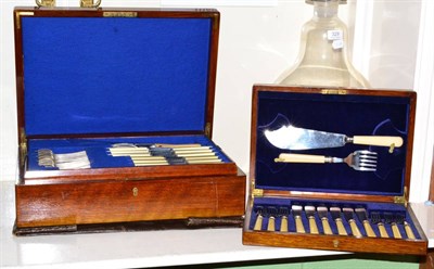 Lot 328 - A cased canteen of plated flatware and a cased fish service