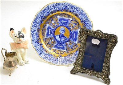 Lot 339 - Coalport South African souvenir plate, silver cream jug, photo frame and model of dog