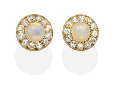 Lot 232 - A Pair of Opal and Diamond Cluster Earrings, a round cabochon opal within a border of old cut...