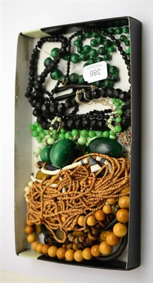 Lot 386 - A coral set pendant on chain, malachite beads and eggs, French jet beads, costume jewellery etc