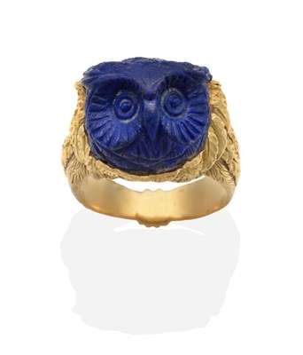 Lot 236 - An Italian Carved Lapis Lazuli Ring, depicting the head of an owl, to a carved 'wing' motif...