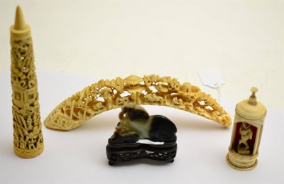 Lot 389 - A 19th century carved ivory double compartment needle holder; a jade type ram on stand; a 19th...