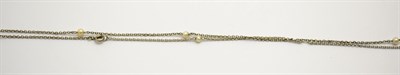 Lot 400 - A long chain, set with eleven simulated pearls, length 80cm