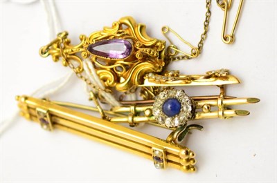 Lot 402 - A sapphire and diamond bar brooch, a triple bar brooch, a seed pearl bar brooch and an amethyst...