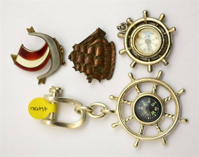 Lot 405 - A group of four sailing related items including a Tiffany & Co silver compass in the form of a...